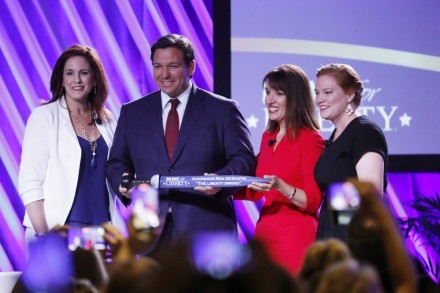Florida Governor Ron DeSantis with Moms for Liberty leaders Tiffany Justice, Tina Descovich, and Marie Rogerson