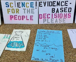 Sign saying Science for the people, evidence based decisions please
